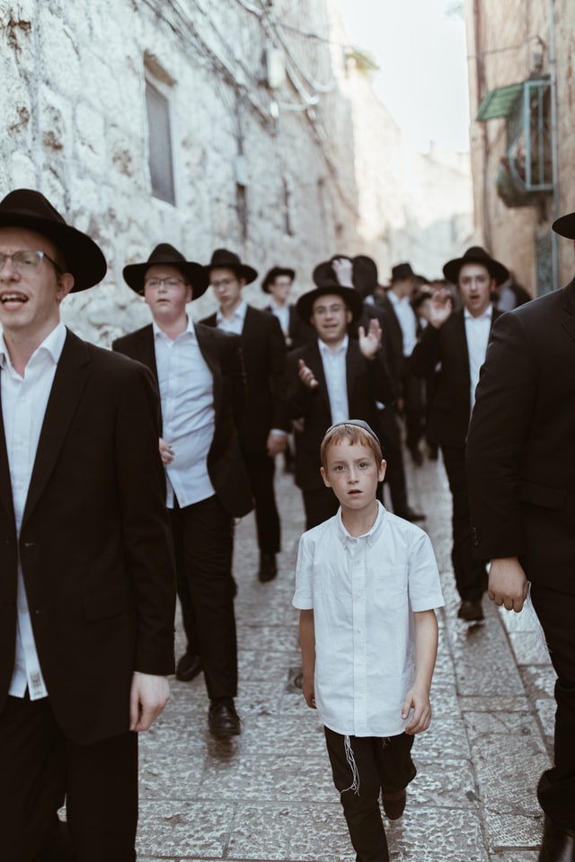 Group of men and boys in traditional Jewish attire